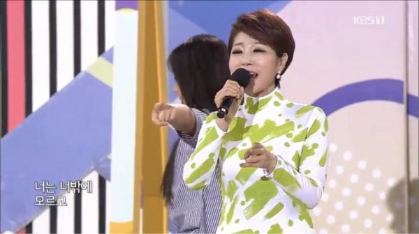 Yu-na, who missed her father of the National Song, was a duet song?