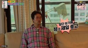 在电视上，金正泰展示了他在釜山龙和洞的家...？